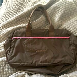 NASCAR weekender bag, brown with pink trim. Great condition.